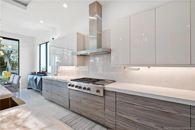 Experience modern waterfront luxury in this stunning - photo 13