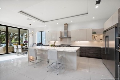 Experience modern waterfront luxury in this stunning - photo 14
