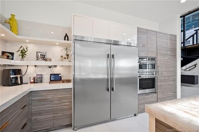 Experience modern waterfront luxury in this stunning - photo 15