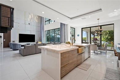 Experience modern waterfront luxury in this stunning - photo 16