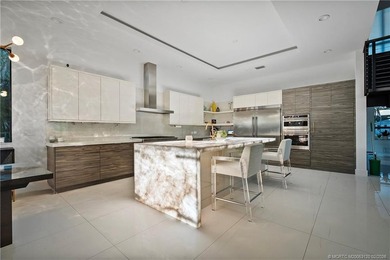 Experience modern waterfront luxury in this stunning - photo 17
