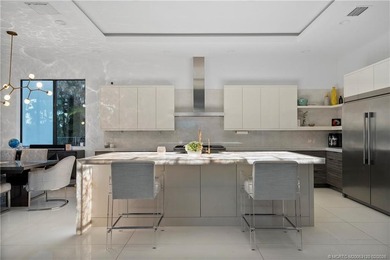 Experience modern waterfront luxury in this stunning - photo 18