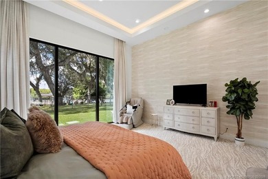Experience modern waterfront luxury in this stunning - photo 22