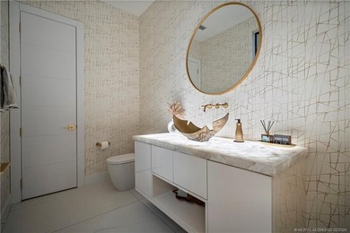 Experience modern waterfront luxury in this stunning - photo 29