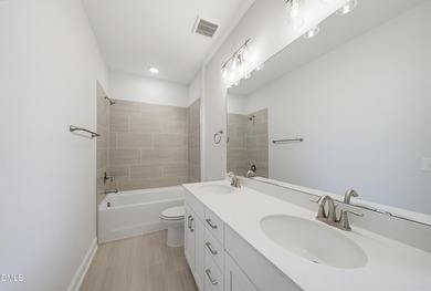 Experience elevated living in one of Hasentree's most private - photo 36