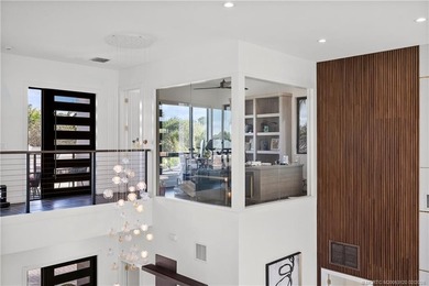 Experience modern waterfront luxury in this stunning - photo 39