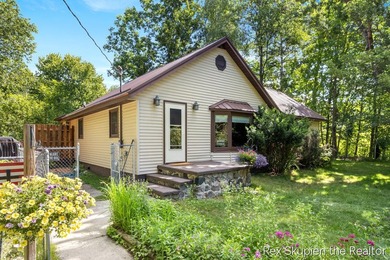 (private lake, pond, creek) Home Active Under Contract in White Cloud Michigan