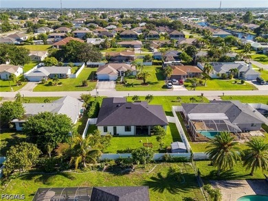 Welcome to 920 SE 15th Ter in Cape Coral, a beautifully - photo 3