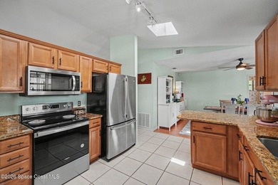 Welcome home to this well-maintained retreat nestled on a quiet - photo 11