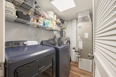 Bayfront Bliss Awaits!  Step into luxury with this fully