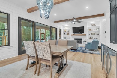 As you enter this welcoming island home, each room offers