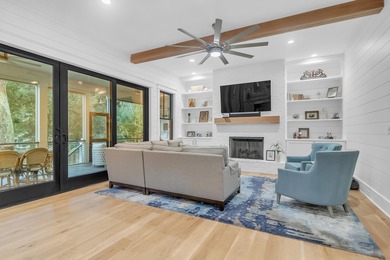 As you enter this welcoming island home, each room offers