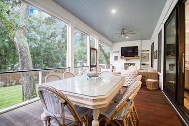 As you enter this welcoming island home, each room offers