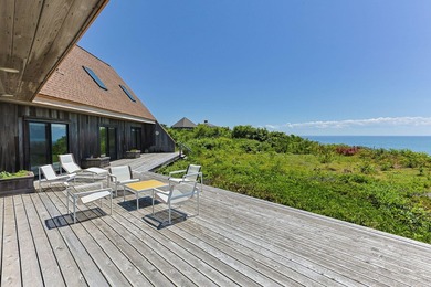 Rising above the shoreline is this Truro retreat, a stunning 4BD - photo 29