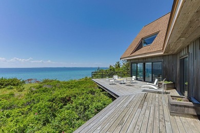 Rising above the shoreline is this Truro retreat, a stunning 4BD - photo 32