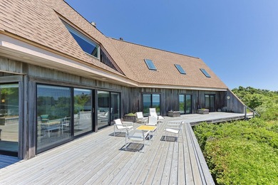 Rising above the shoreline is this Truro retreat, a stunning 4BD - photo 33