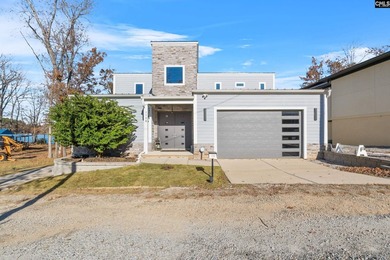 Close in to Chapin, this 2021 custom-built home, offers a wow - photo 2