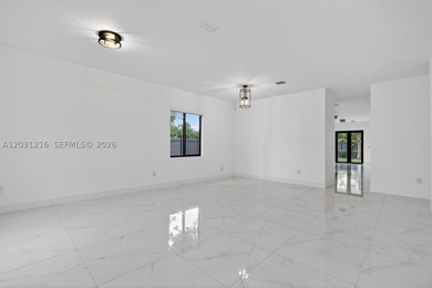 Built in 2023, this modern single-family residence offers the - photo 3