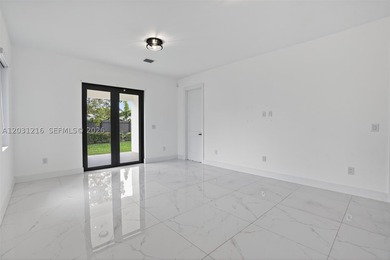 Built in 2023, this modern single-family residence offers the - photo 8
