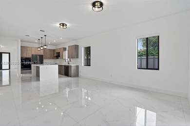 Built in 2023, this modern single-family residence offers the - photo 10