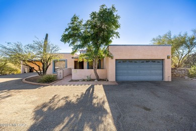 This well-kept home offers an open floor plan with vaulted