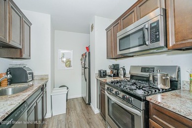 Stunning fully renovated 2-bedroom, 1-bath condo in the highly - photo 11