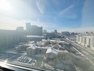 Exquisitely renovated corner residence offering 1,129 sq ft of