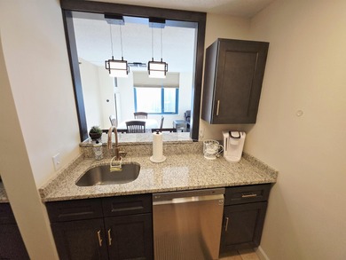 Exquisitely renovated corner residence offering 1,129 sq ft of