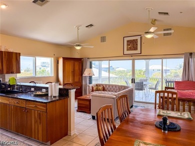 Elevated Living, Gulf Views & Rooftop Sunsets Imagine pulling up - photo 18