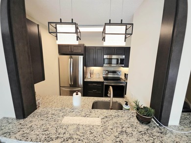 Exquisitely renovated corner residence offering 1,129 sq ft of