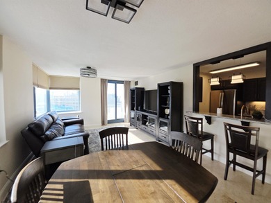 Exquisitely renovated corner residence offering 1,129 sq ft of