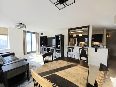 Exquisitely renovated corner residence offering 1,129 sq ft of