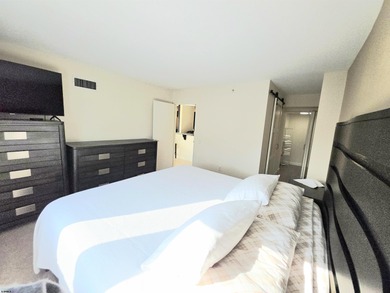 Exquisitely renovated corner residence offering 1,129 sq ft of