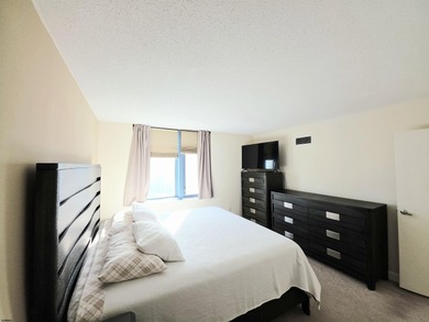 Exquisitely renovated corner residence offering 1,129 sq ft of