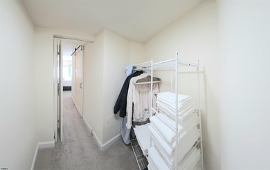 Exquisitely renovated corner residence offering 1,129 sq ft of