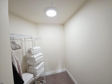 Exquisitely renovated corner residence offering 1,129 sq ft of