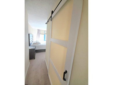 Exquisitely renovated corner residence offering 1,129 sq ft of