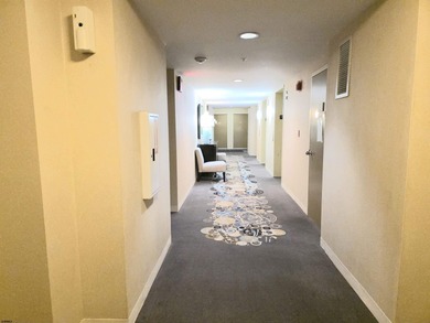 Exquisitely renovated corner residence offering 1,129 sq ft of