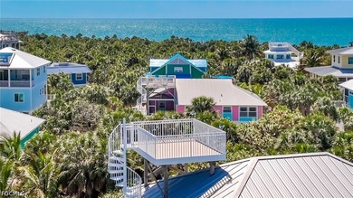 Elevated Living, Gulf Views & Rooftop Sunsets Imagine pulling up - photo 47