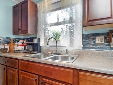 Welcome to this charming lakeside retreat tucked away on a - photo 18
