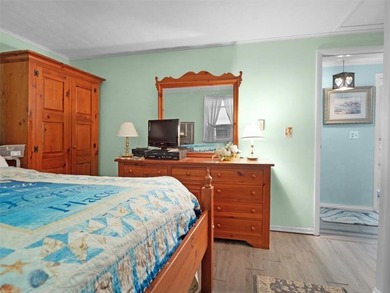 Welcome to this charming lakeside retreat tucked away on a - photo 23