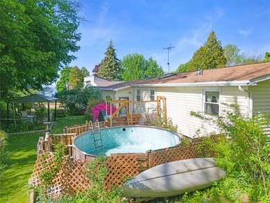 Welcome to this charming lakeside retreat tucked away on a - photo 37