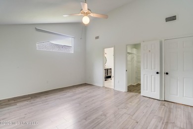 Adorable home in Diamondhead featuring stainless steel - photo 18