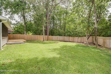 Adorable home in Diamondhead featuring stainless steel - photo 29