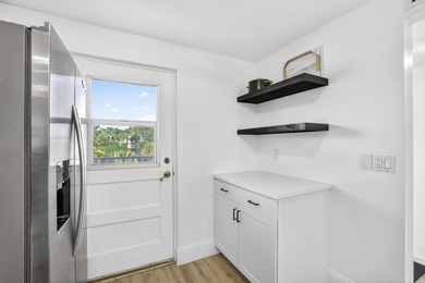 Discover this 2-bedroom, 2-bathroom condominium in the - photo 6
