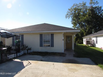 INCOME OPPORTUNITY! Half of a 3/2 duplex, 1073 sqft, with newer - photo 1
