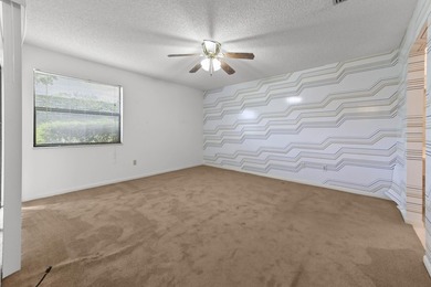 Welcome to this charming two-bedroom, two-bathroom condominium - photo 11