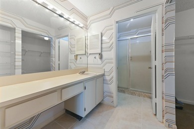 Welcome to this charming two-bedroom, two-bathroom condominium - photo 12