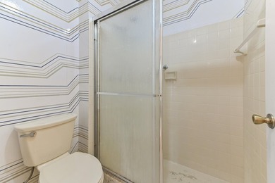 Welcome to this charming two-bedroom, two-bathroom condominium - photo 13