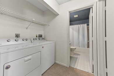 Welcome to this charming two-bedroom, two-bathroom condominium - photo 18